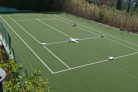 Construction d'un court et terrain de tennis en gazon synthétique